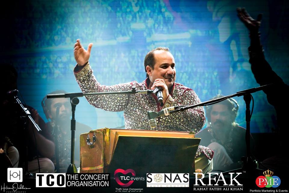 Rahat Fateh Ali Khan performing at a live concert.
