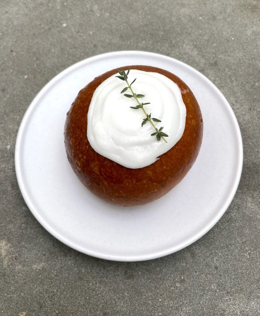 A broiche bun filled with lemon cream at Salvo Bakehouse. 